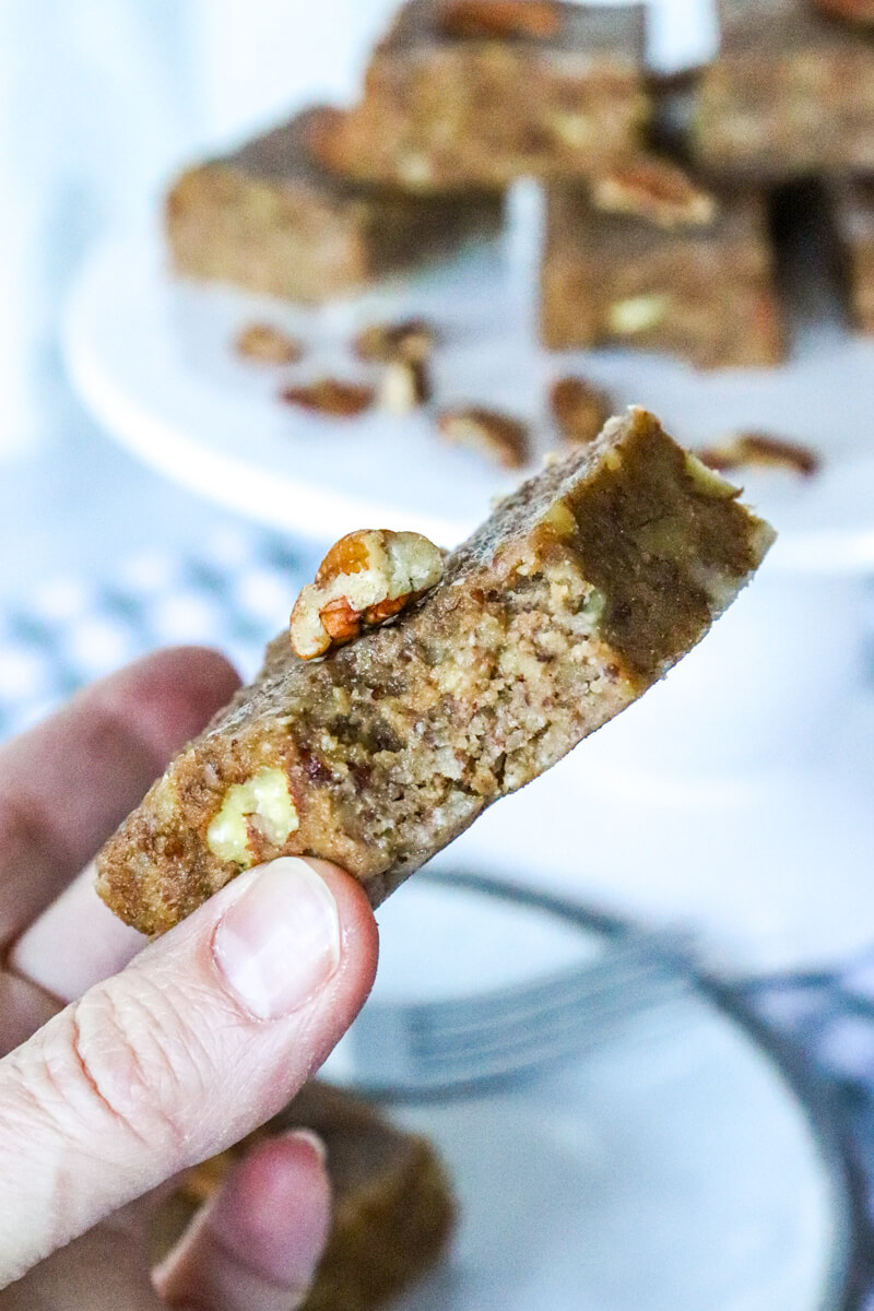 Bite out of one keto pecan pie bar
