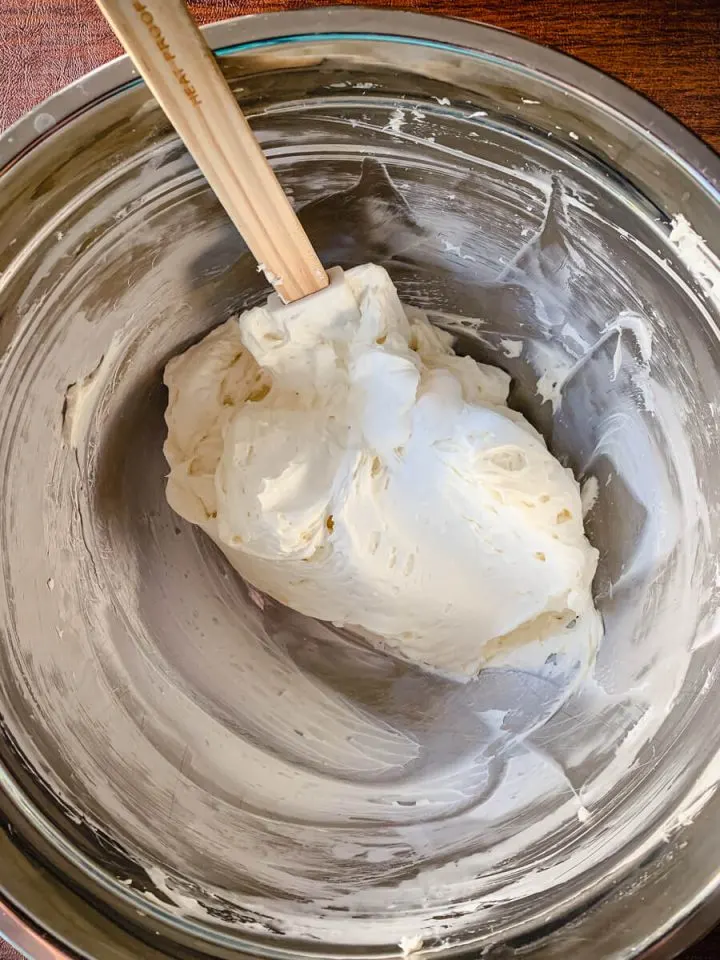 Keto cream cheese frosting in a bowl