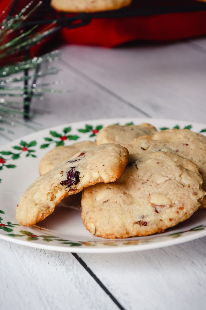 Bite out of a keto Christmas cookie on a plate