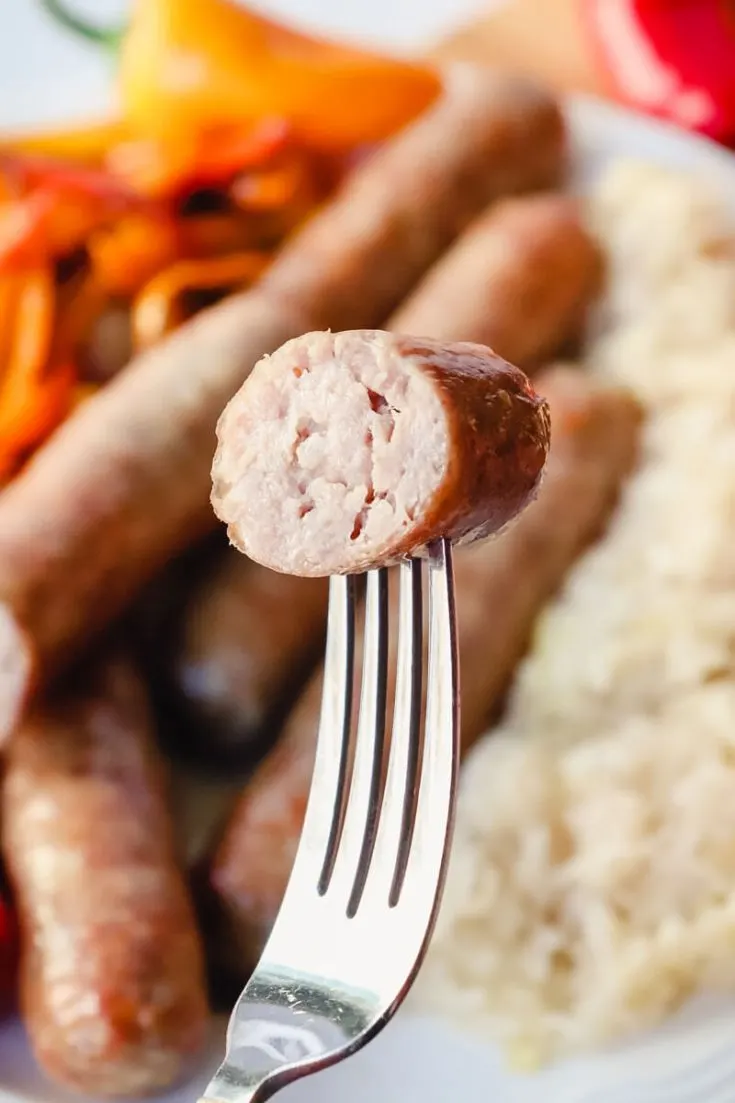 Bite of brat cooked in the air fryer