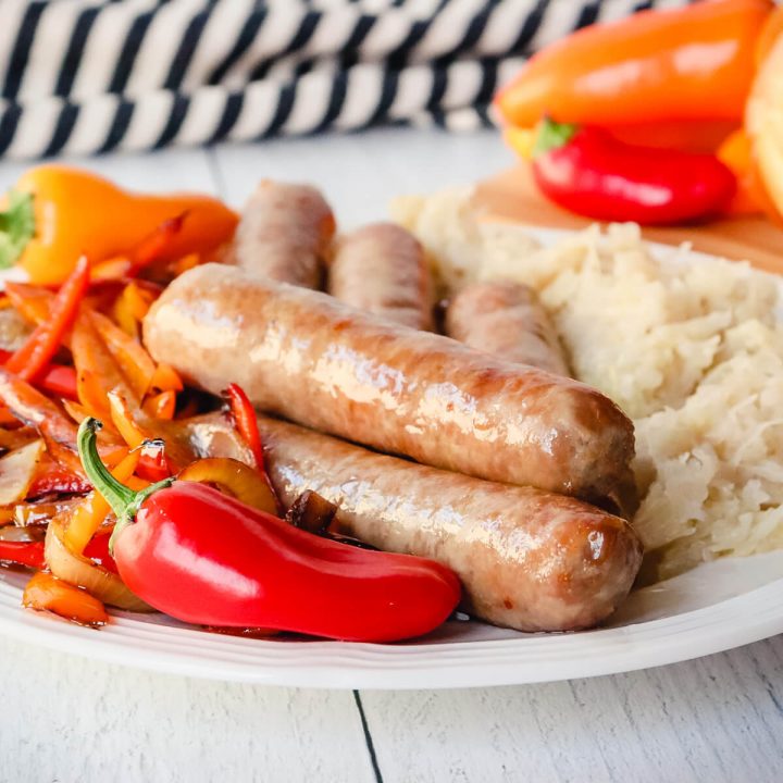 Brats in air fryer on a plate