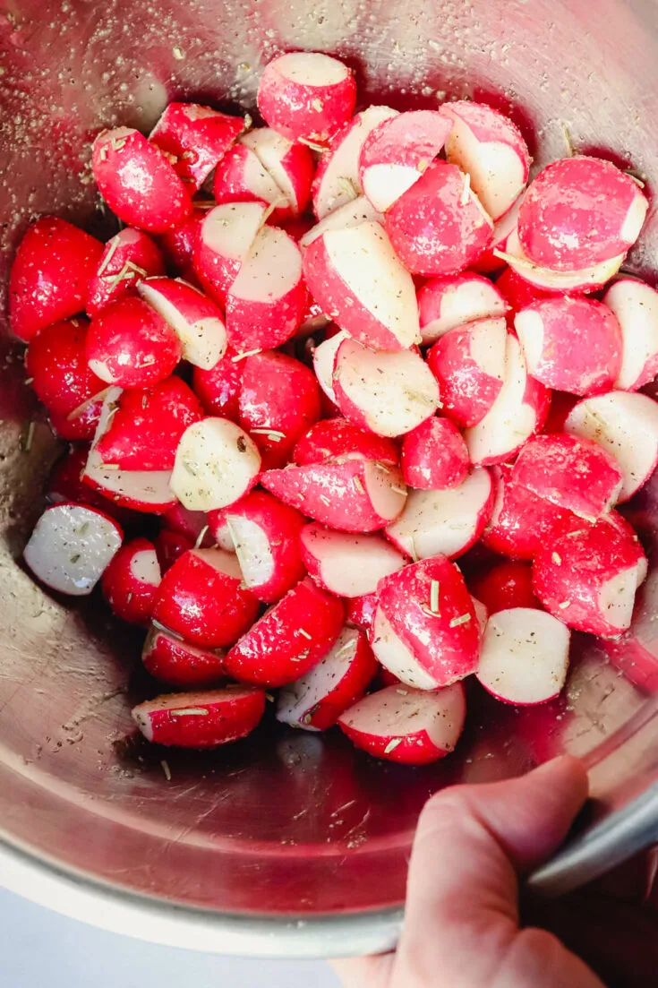 Seasoned and oil covered air fryer radishes