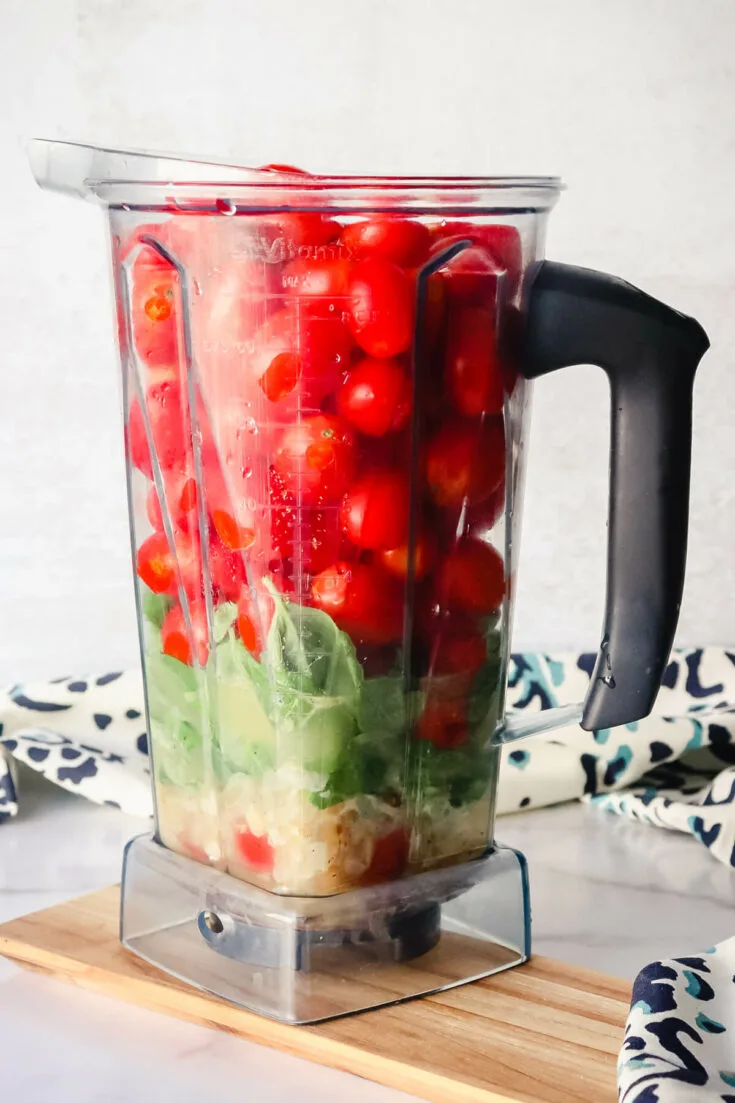 Blender of tomatoes and basil