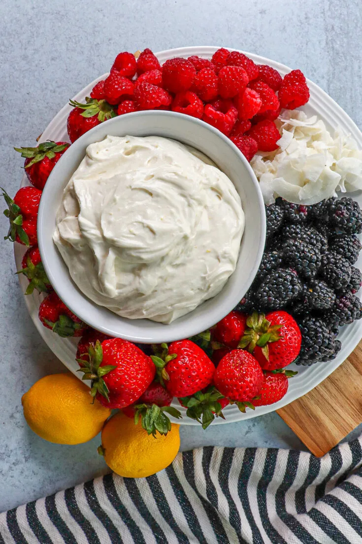Overhead view of keto fruit dip on a platter