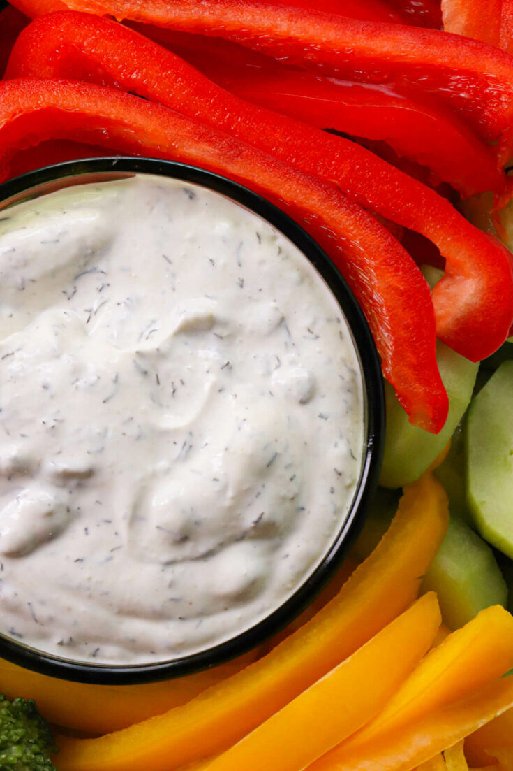 Overhead view of keto dill dip and peppers