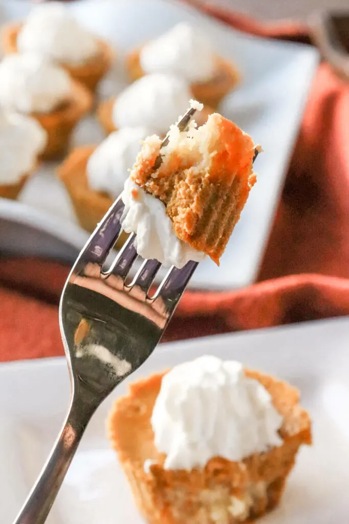Bite of a mini keto pumpkin pie on a fork