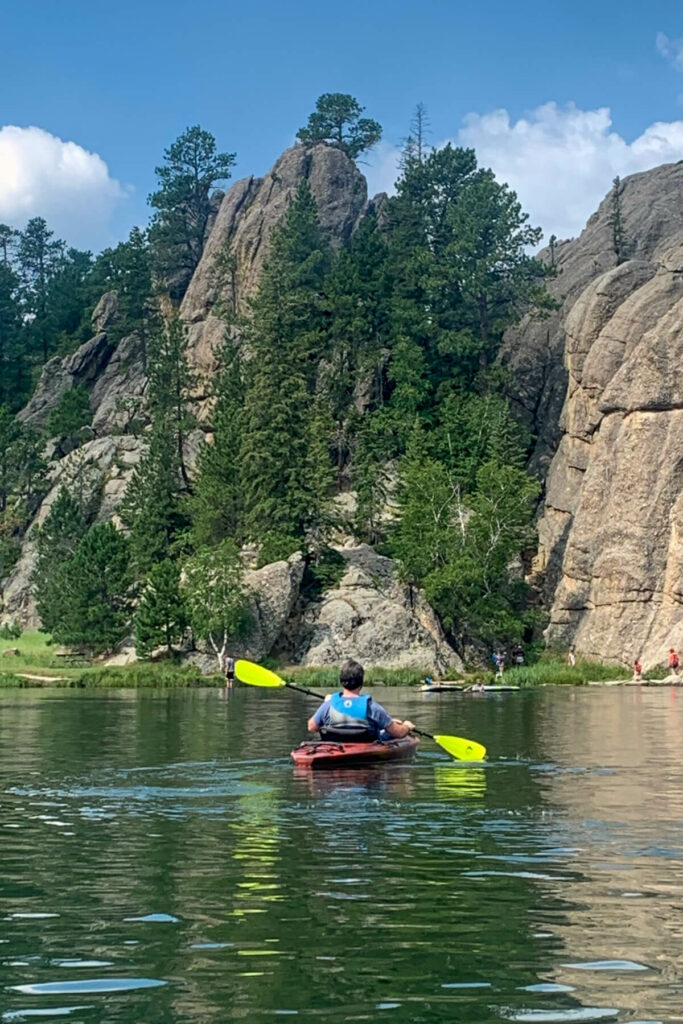 Man kayaking on Sylvan Lake