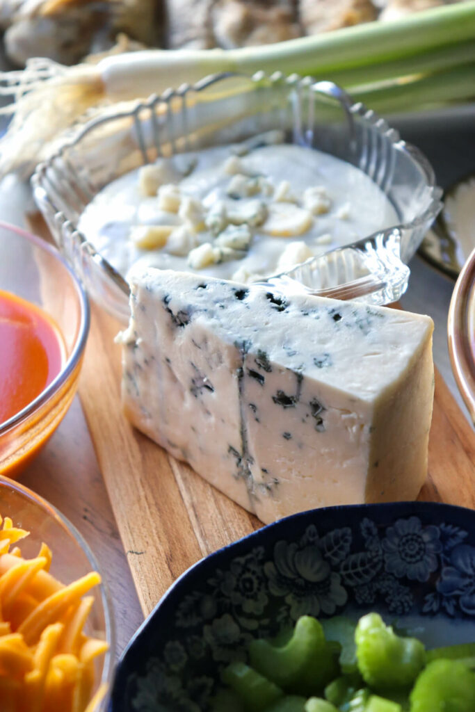 Blue cheese and blue cheese dressing with other ingredients around