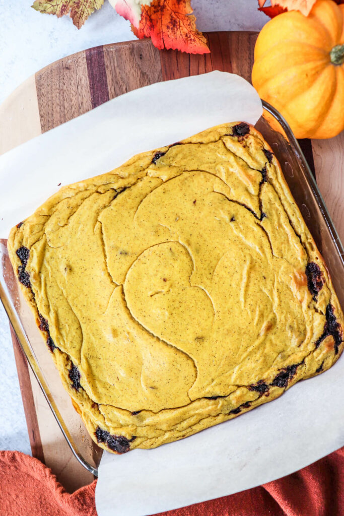 Overhead view of baked keto pumpkin brownies in a dish