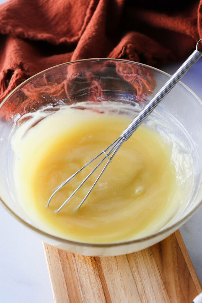 Glass bowl with melted cocoa butter