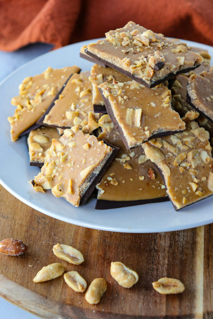 Chocolate peanut butter bark on a white plate
