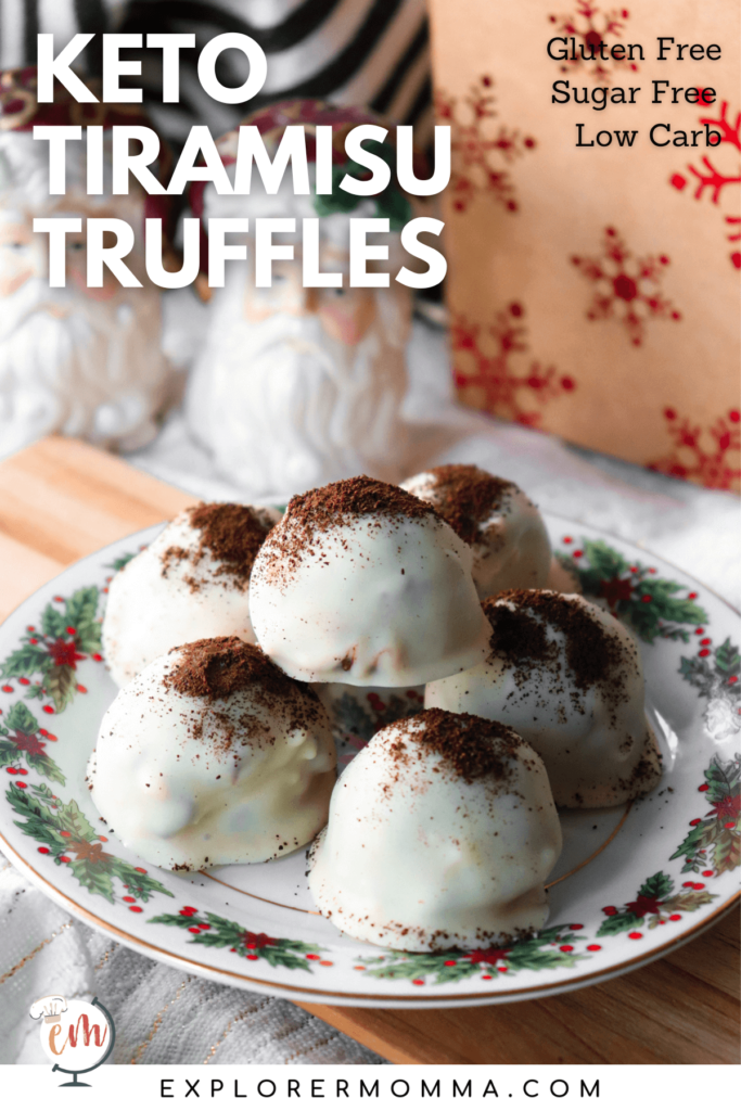Christmas decorations surround a plate of keto tiramisu truffles.