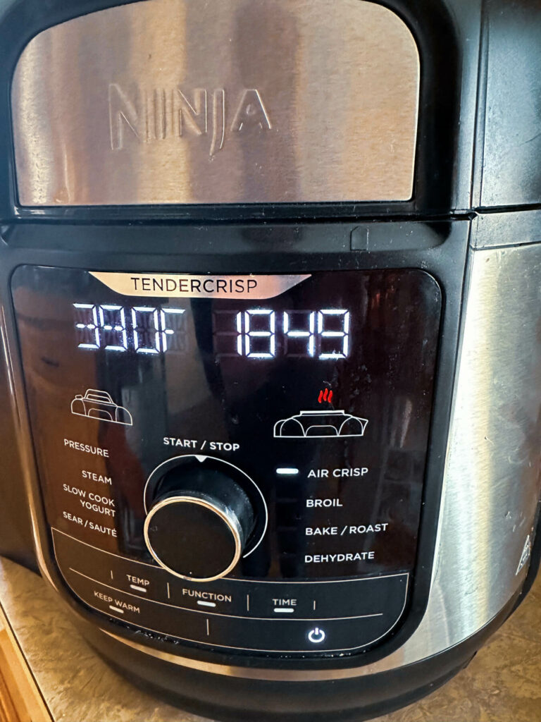 Front view of a Ninja Foodi cooking