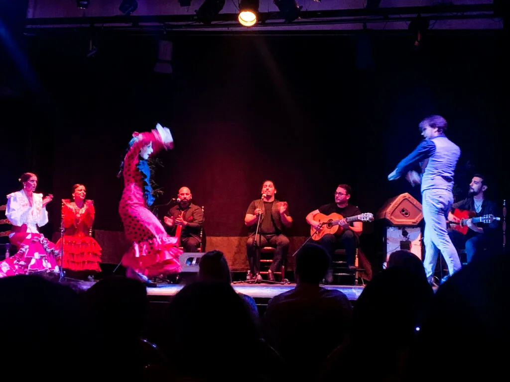 2 Flamenco dancers dancing on stage