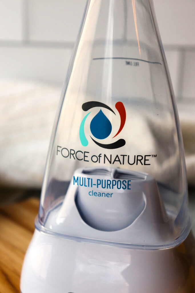 A close up view of the Force of Nature cleaner maker appliance.
