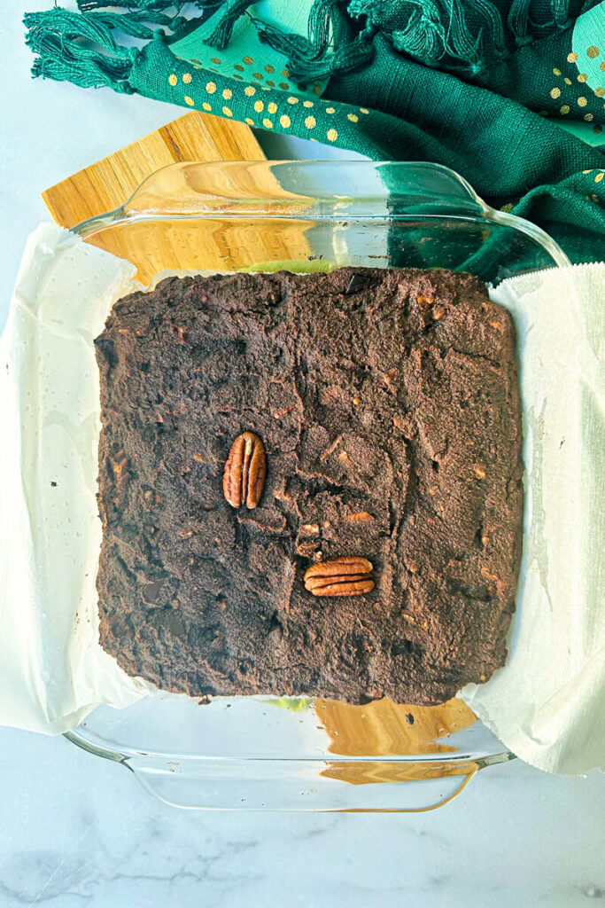 Coconut flour keto brownies baked in a prepared baking dish