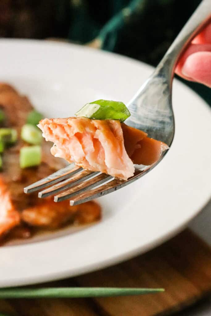 A bite of keto teriyaki salmon air fryer recipe on a fork