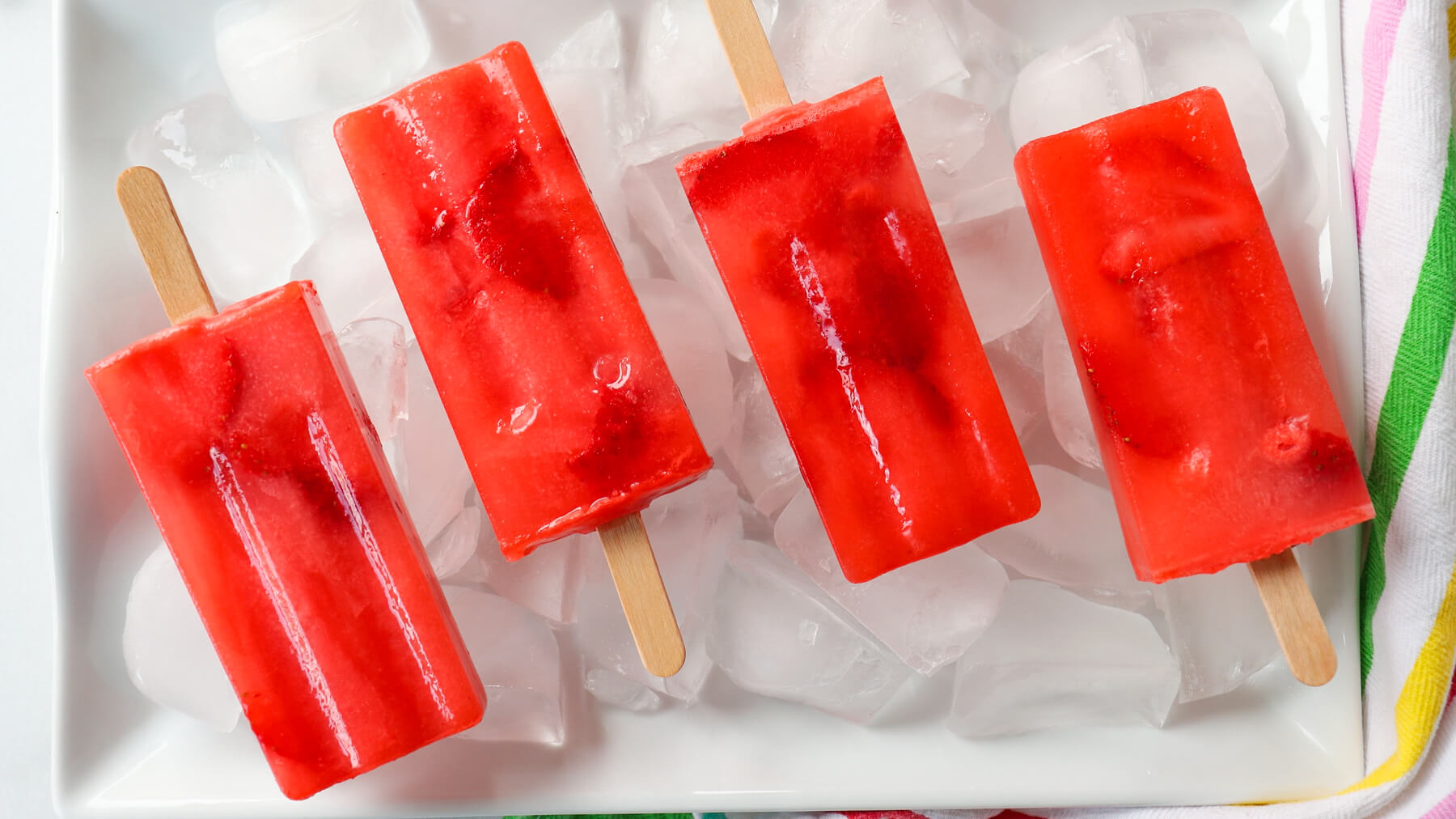 https://explorermomma.com/wp-content/uploads/2023/03/Strawberry-Lemonade-popsicles-14.jpg