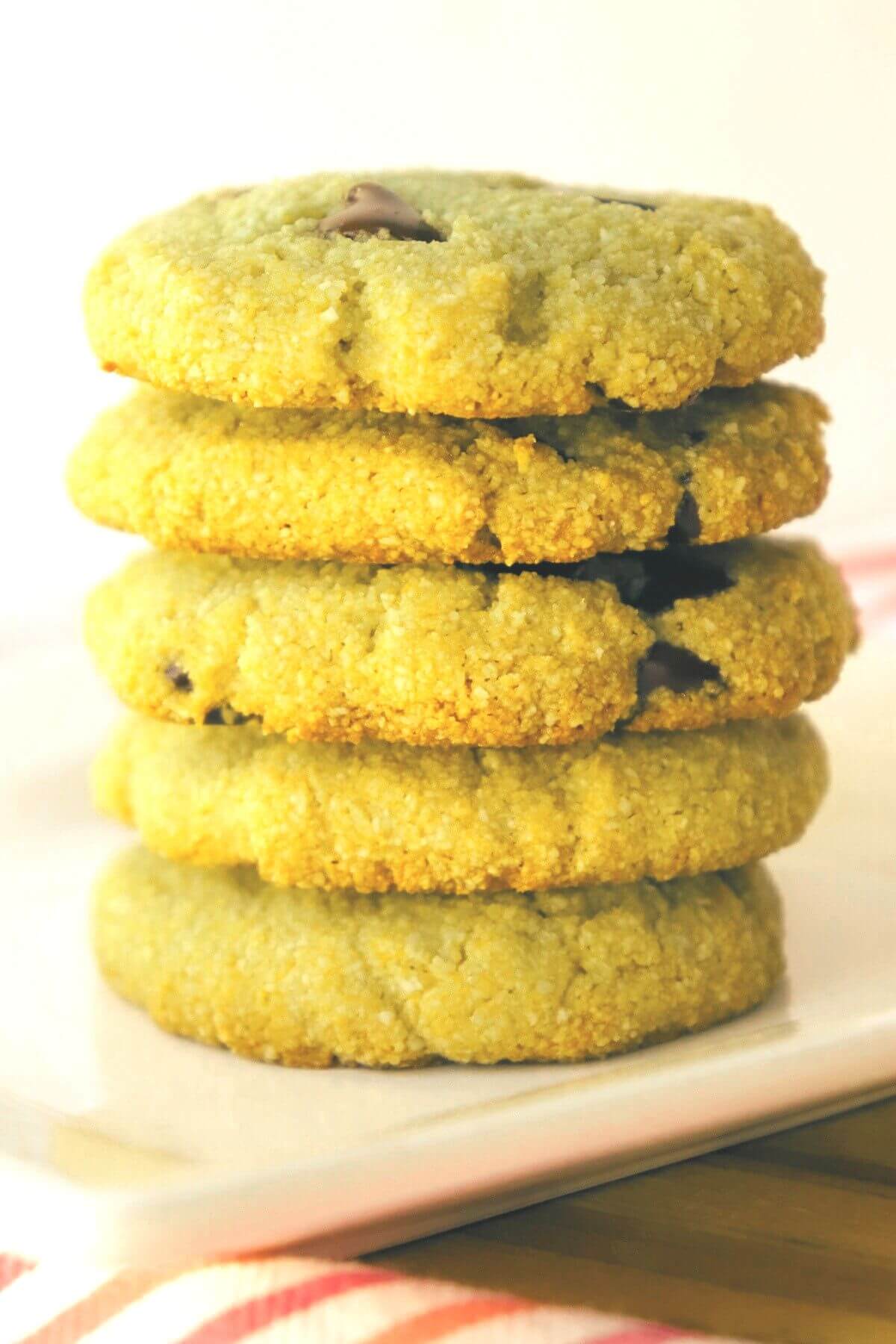 A stack of keto matcha cookies on a white plate