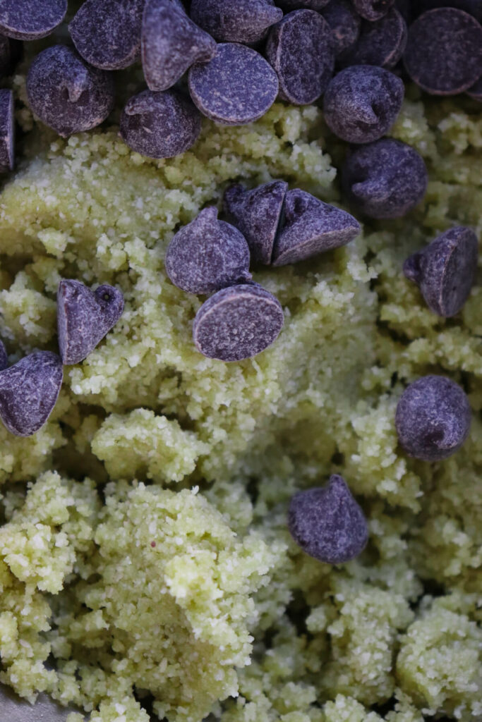 Closeup view of low carb matcha cookie dough with sugar free chocolate chips