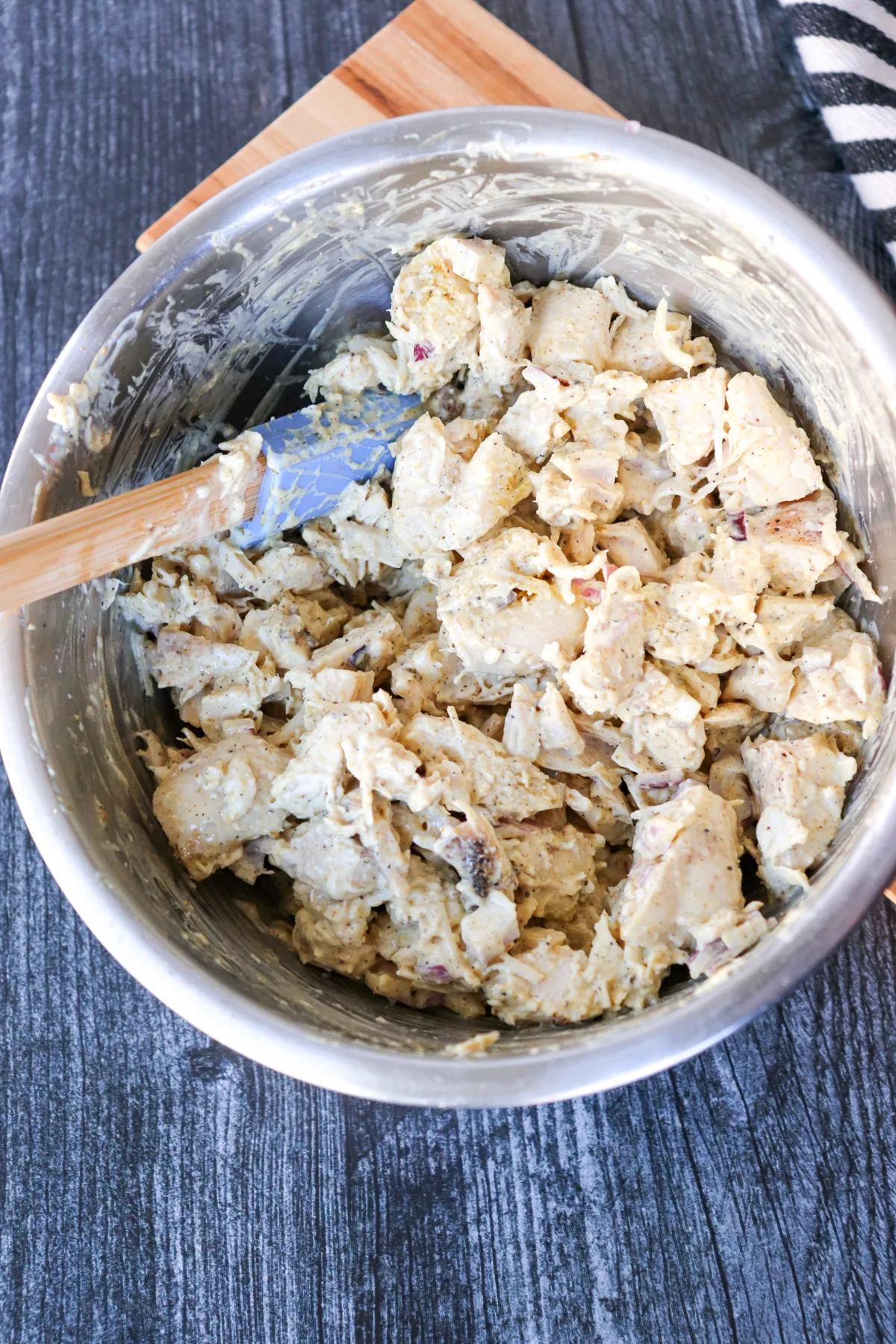 Overhead view of a metal bowl of low carb curry chicken salad