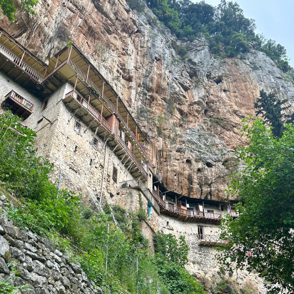 A view of the Prodromos Monastery on the side of the cliff on the Menalon Trail