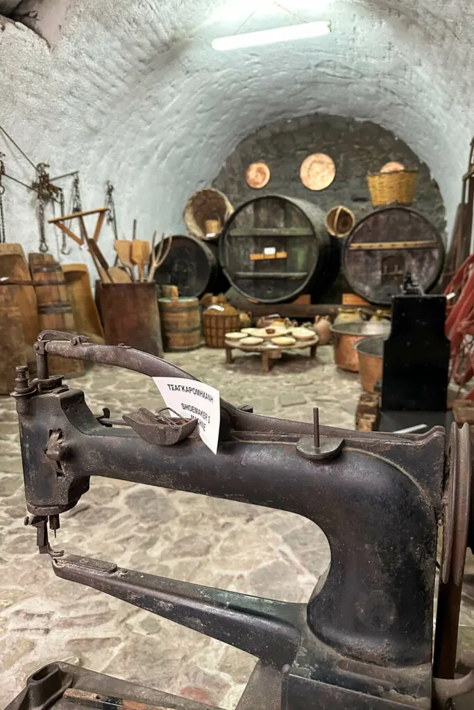 Room in the Folklore Museum of Andritsaina with an old sewing machine and daily household items from the past