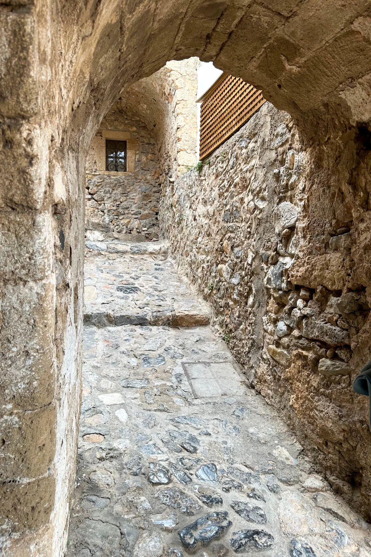 A stone archway going into the lower section of Monemvasia