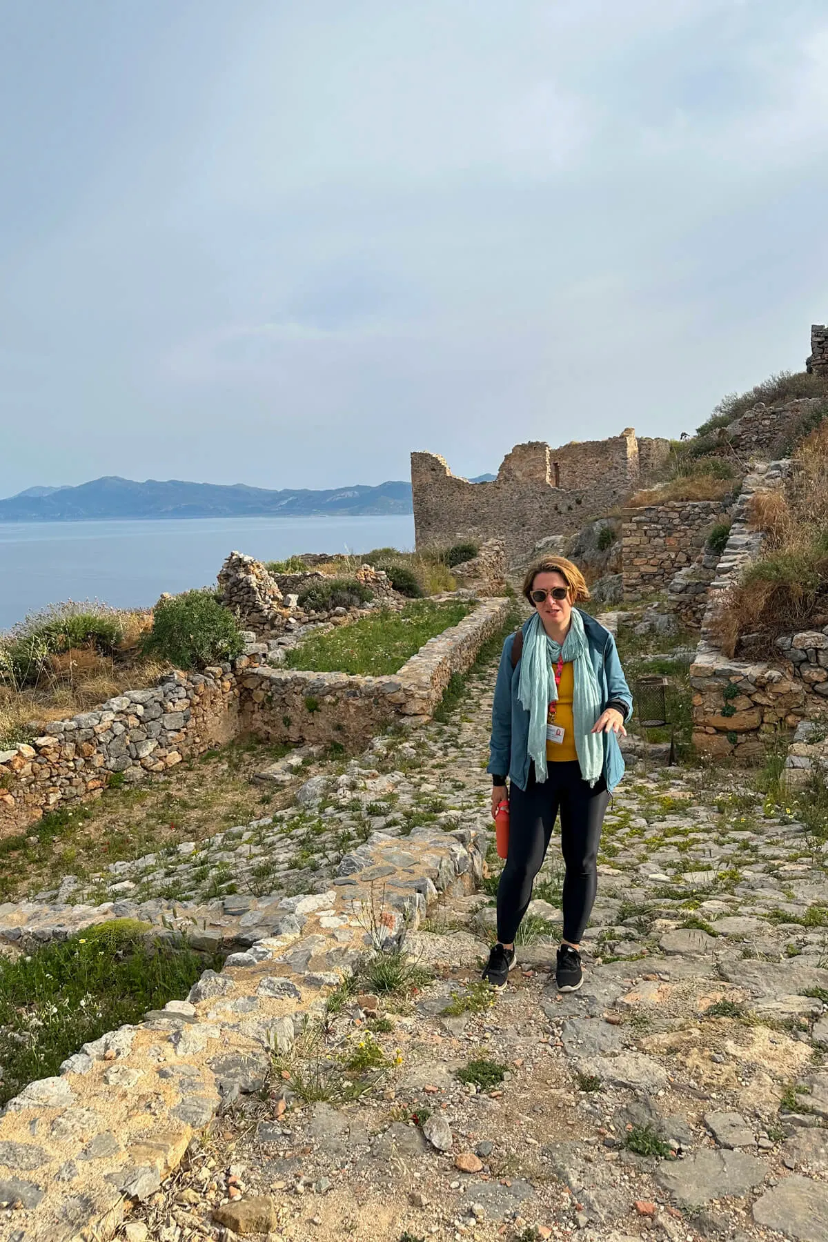 Our guide Effie, standing next to some of the structures recently uncovered