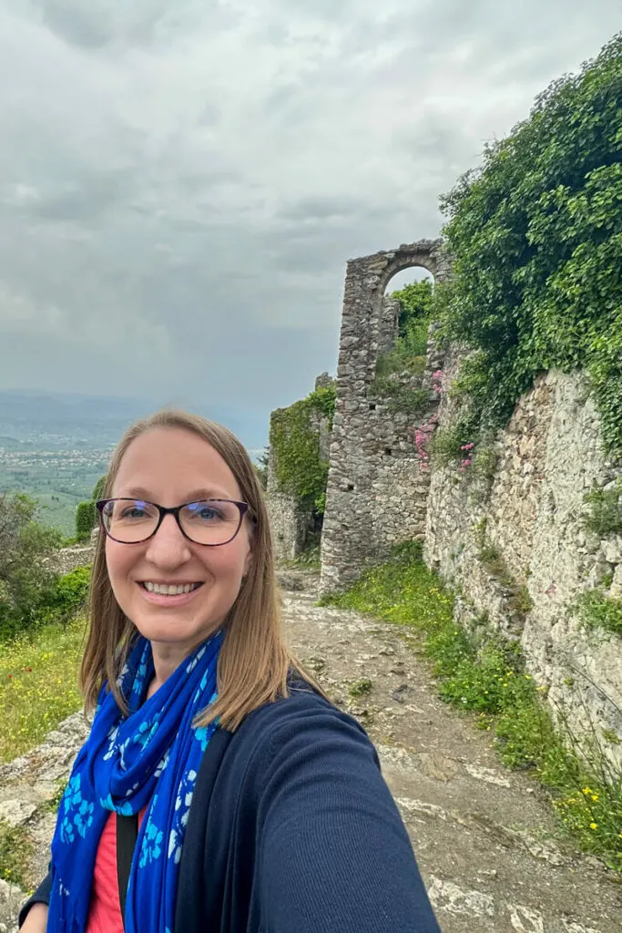 Lauren with the ruins next to the church of Agia Sofia in Mystras