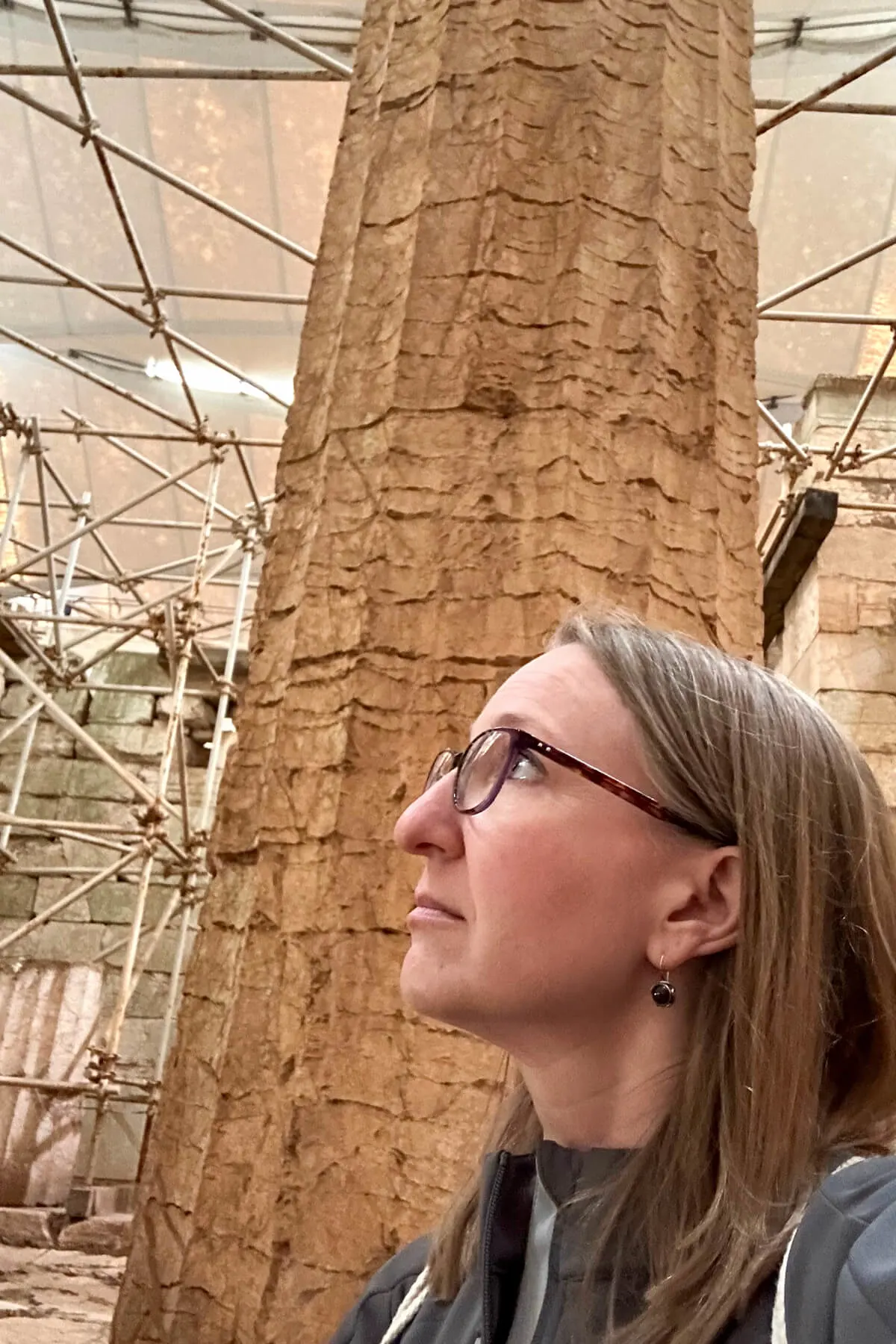 Lauren looking up at the pillars in the Temple of Apollo Epicurius at Bassae