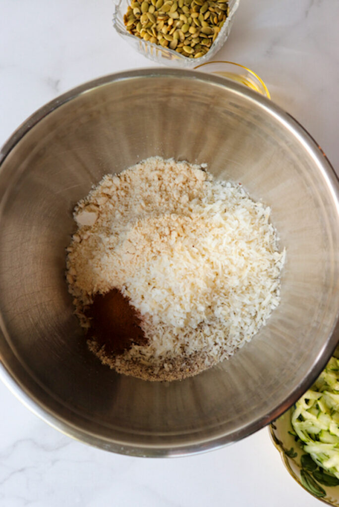 Overhead view of dry ingredients in a metal bowl