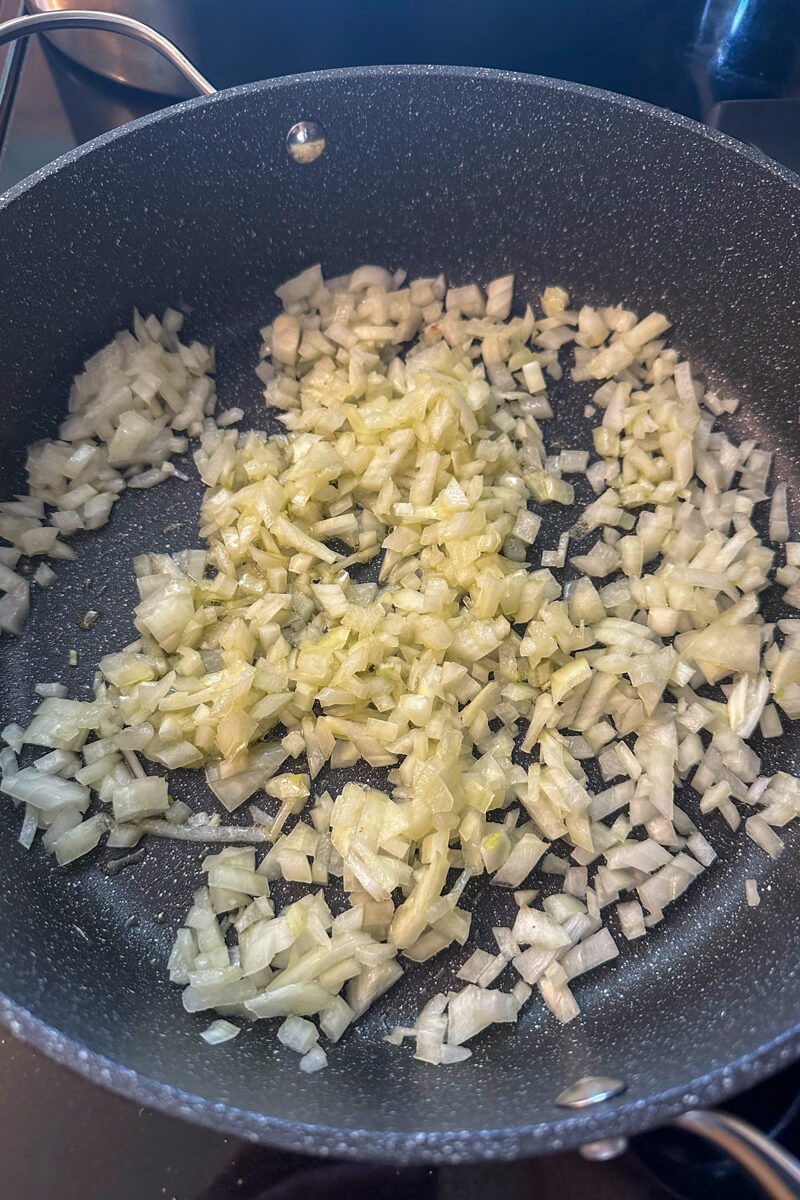 Overhead view of the skillet with fried onions.