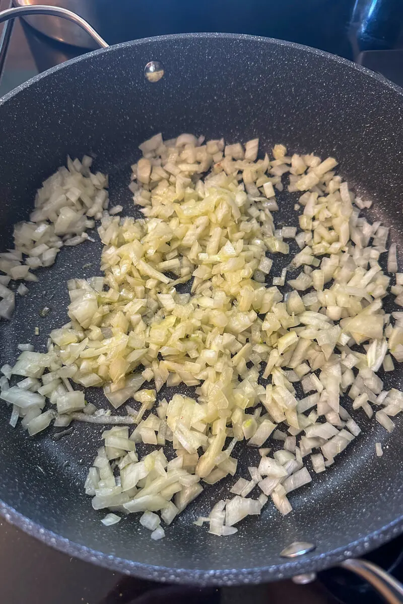 Overhead view of the skillet with fried onions.