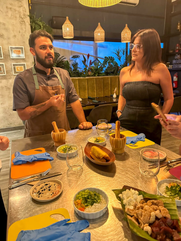 Chef Manuel and class member at the cooking class in Puerto Rico