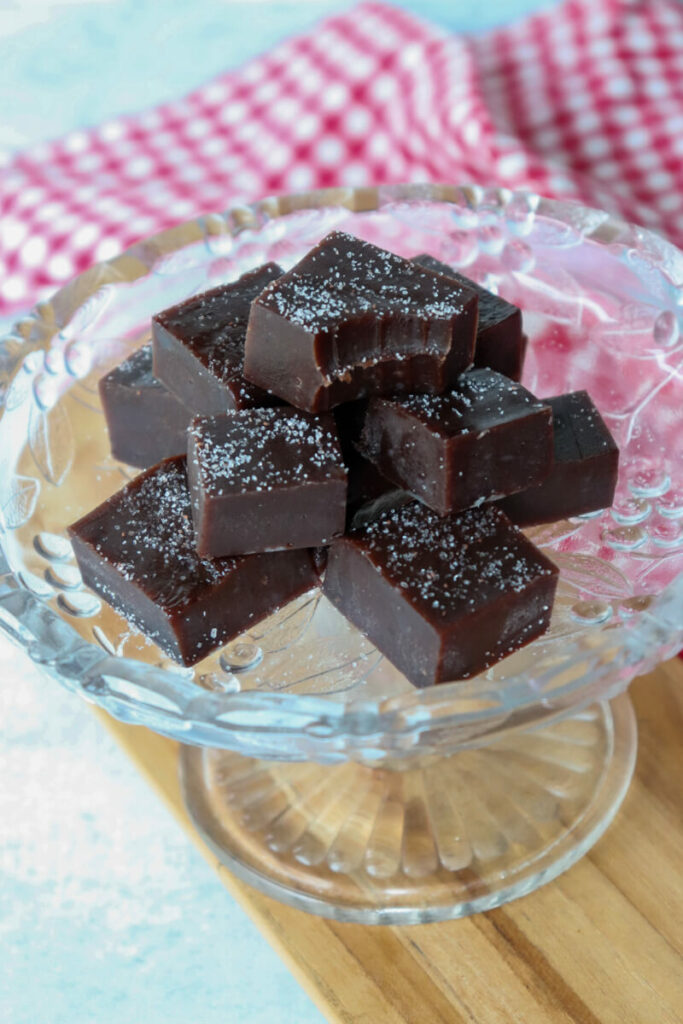 Front overhead view of a bite taken out of a piece of keto fudge