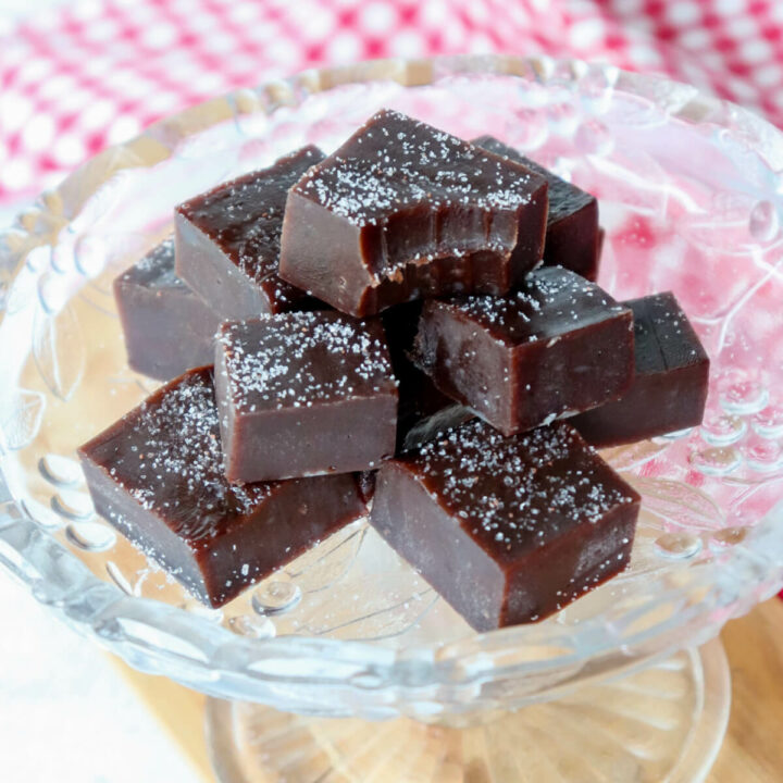 A stack of keto protein fudge on a glass dish