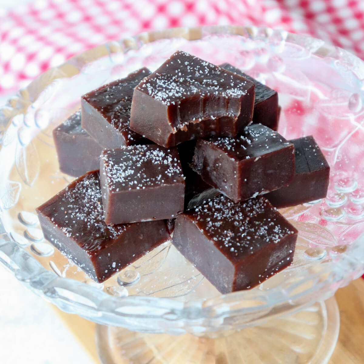 A stack of keto protein fudge on a glass dish