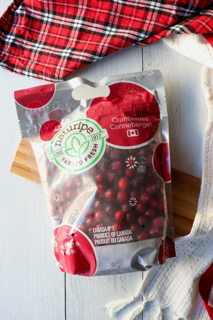 Overhead view of a bag of fresh organic cranberries