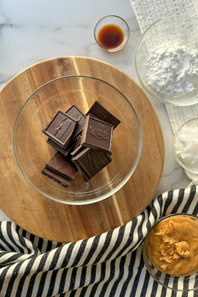 Overhead view of a glass bowl of chocolate