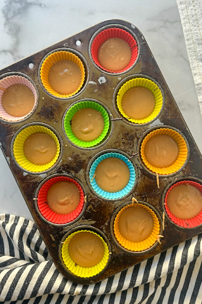 Overhead view of cups with chocolate and peanut butter layers