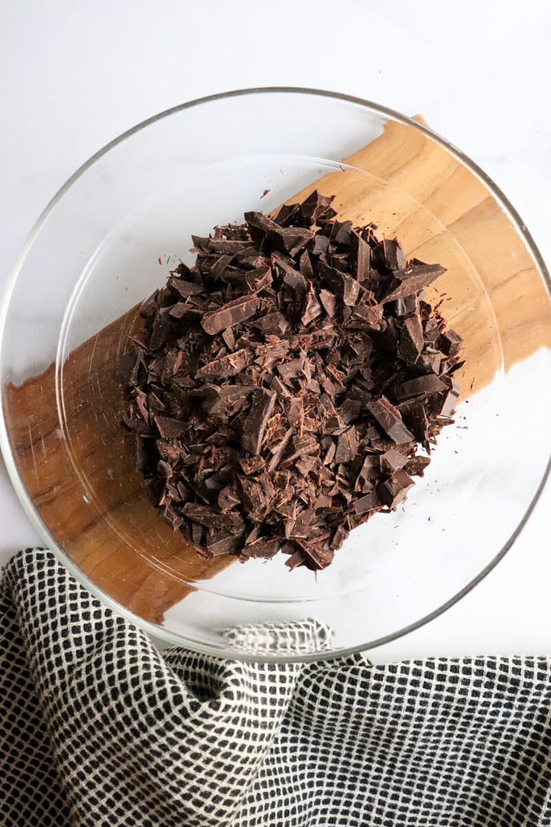 Overhead view of chopped unsweetened chocolate.