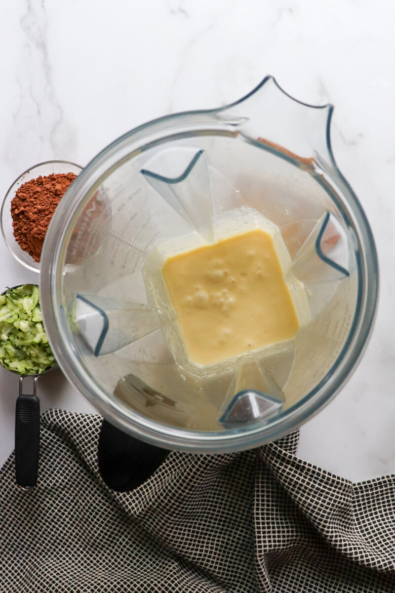 Overhead view of the blended with the wet ingredients.