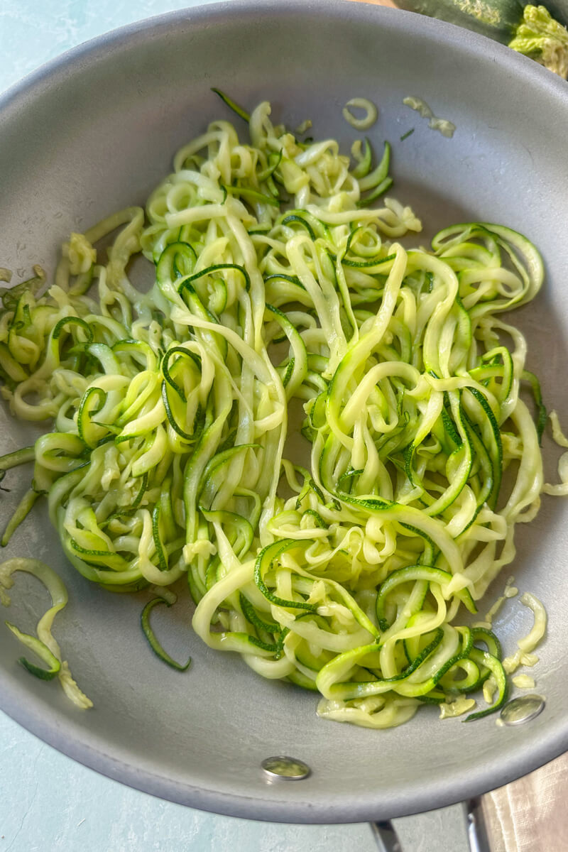 Metal skillet cooking low carb zoodles (zucchini noodles)