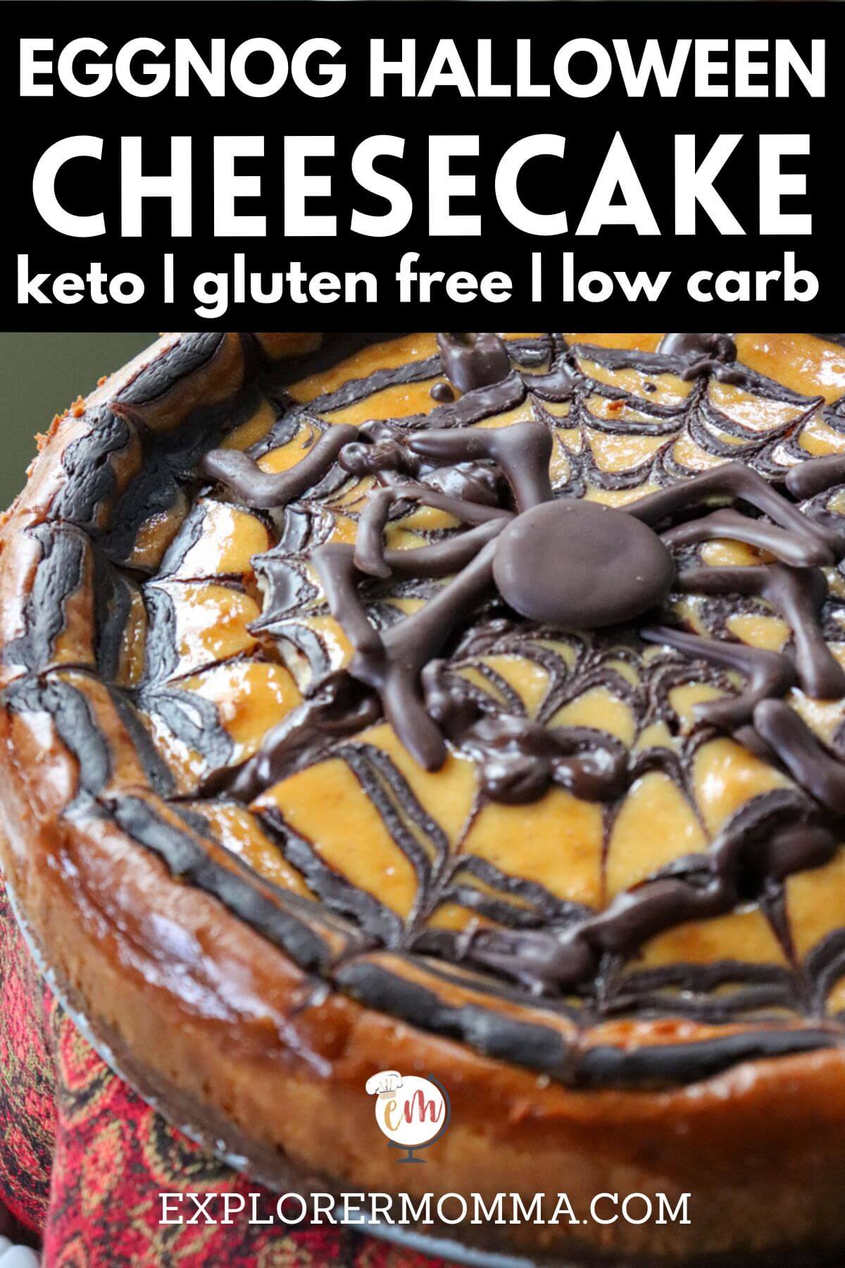 Front overhead view of a keto eggnog cheesecake with a chocolate spider web perfect for Halloween