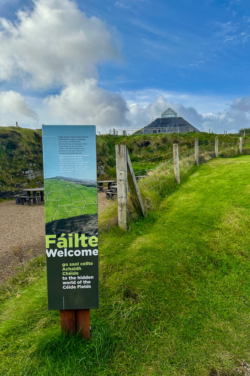 The triangular visitor centre at Ceide Fields, Mayo, Ireland with a welcome, Fáilte, sign in front