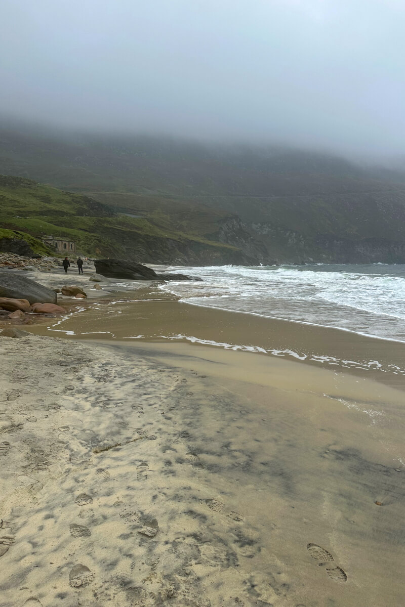 Sandy beach or Keem Beach with the mist coming down