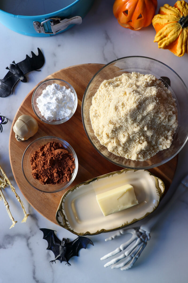 Overhead view of the ingredients for the keto eggnog cheesecake chocolate crust.