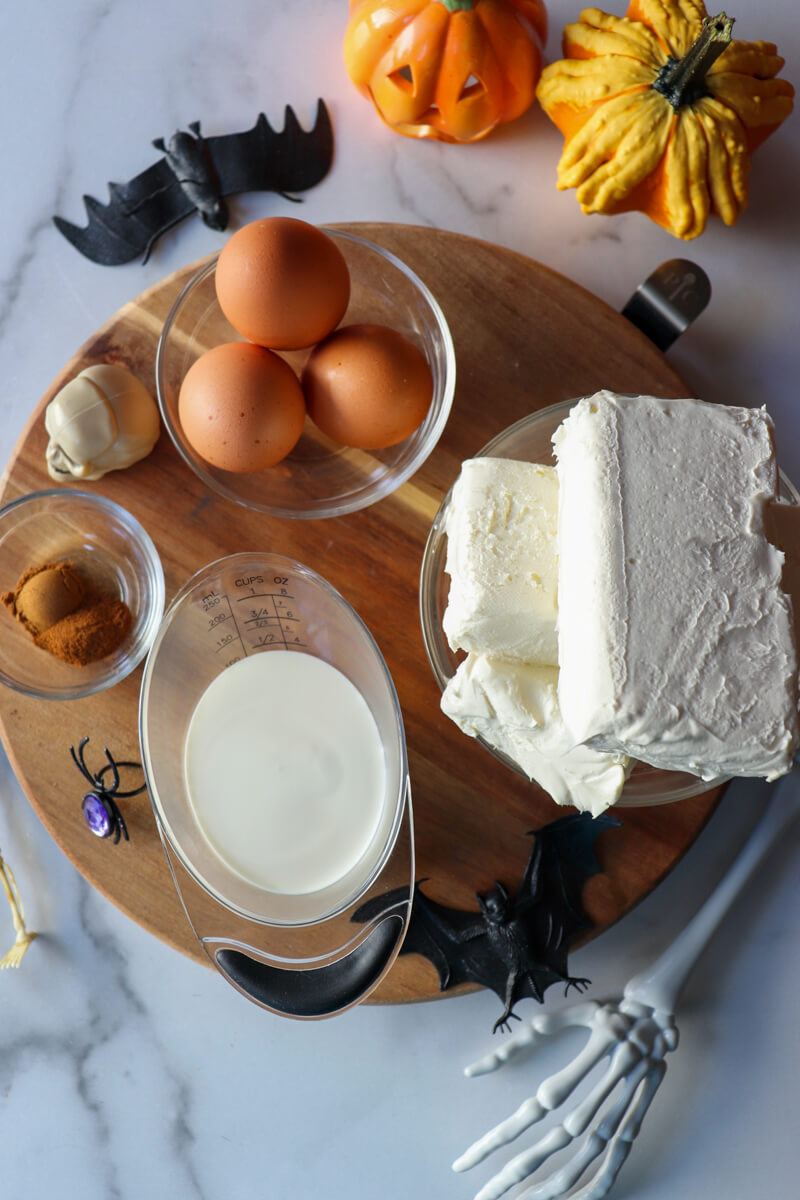 Overhead view of the ingredients for the keto eggnog cheesecake.