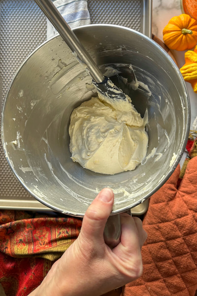 A metal bowl with the sugar free cream cheese filling